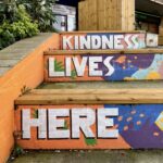Kindness Lives Here mural opposite Thornton Heath station, designed by Vân Dang