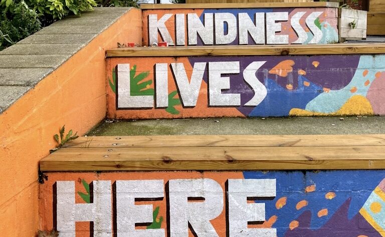 Kindness Lives Here mural opposite Thornton Heath station, designed by Vân Dang