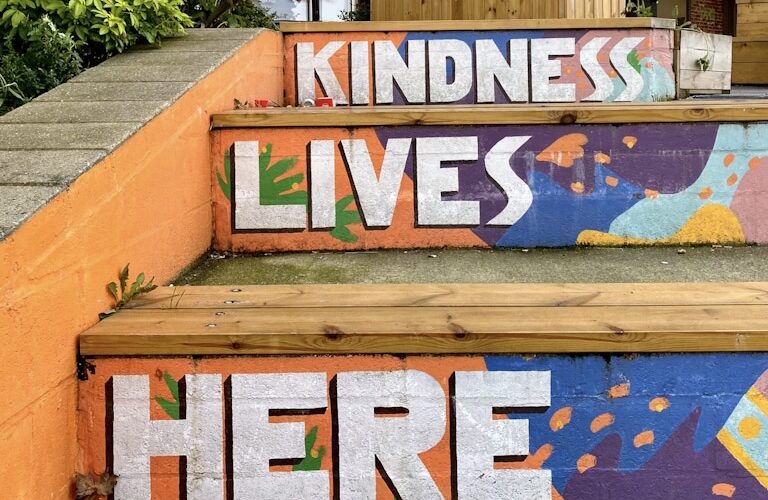 Kindness Lives Here mural opposite Thornton Heath station, designed by Vân Dang