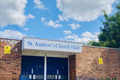 Front entrance to St Andrews Church Hall in Thornton Heath. Blue sky & white cloudsin background.