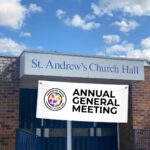 Photo of St Andrew's Church Hall with blue skies and clouds. Banner depicting TCAT logo and text: Annual General Meeting